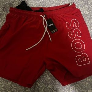 Brand new never worn BOSS swimming trunks .